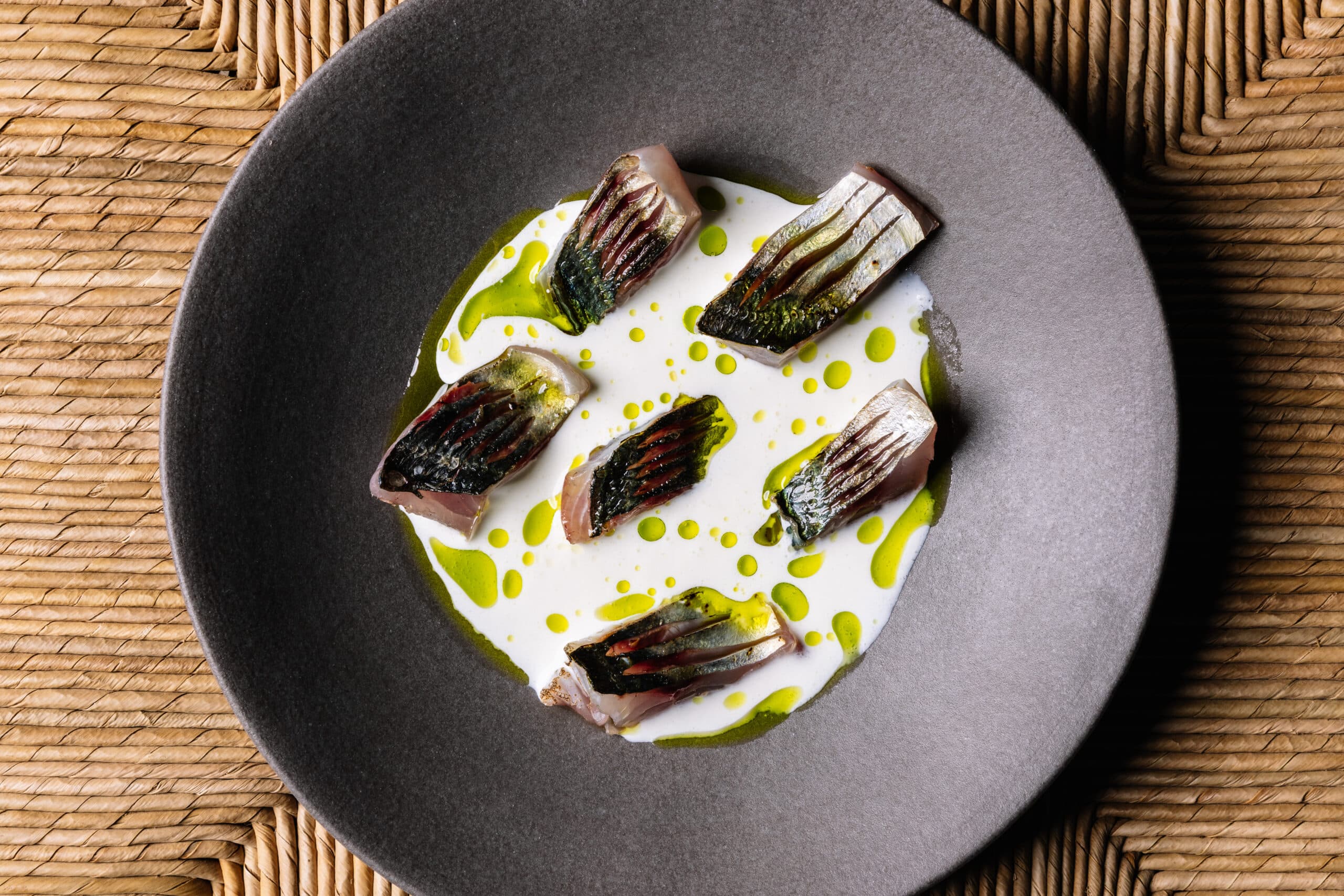 Cured “txitarro” with white almond garlic sauce